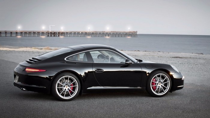 Black Porsche 911 Carrera by the Ocean