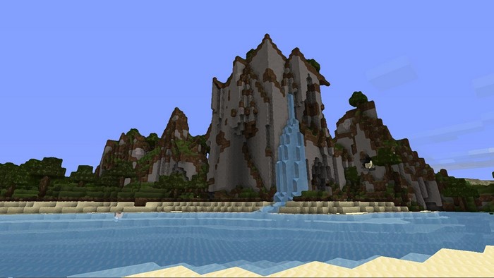 Minecraft island with waterfall and mountains