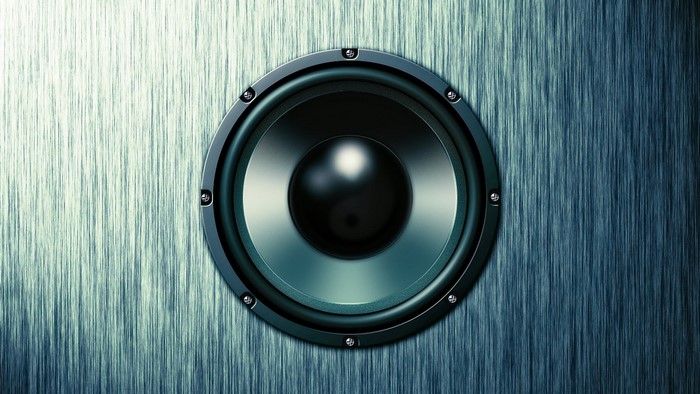 Speaker on a textured blue background