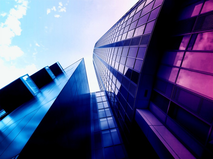Modern skyscrapers against a blue sky