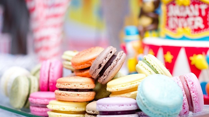Colorful Macarons on a Glass Plate