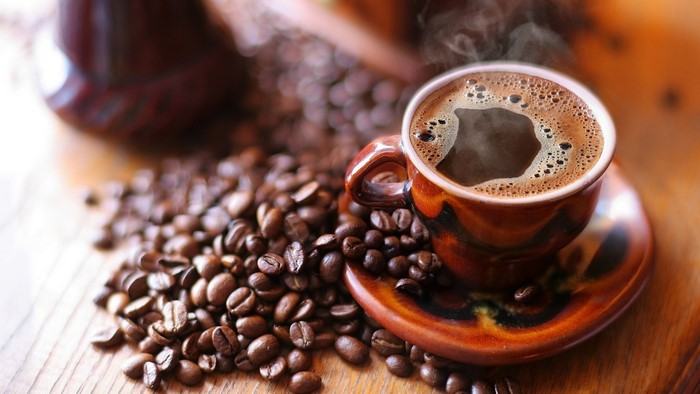 Cup of Coffee with Roasted Beans