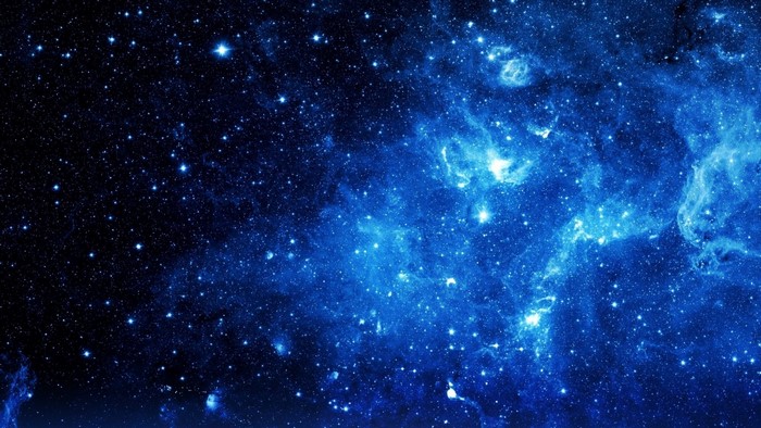 Blue Galaxy Filled with Stars and Nebulae