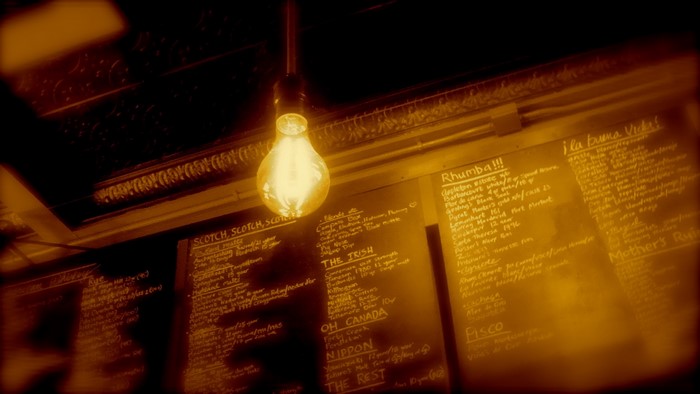 Menu board with light bulb