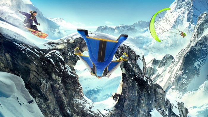 Wingsuit flyer, snowboarder, and paraglider in mountains