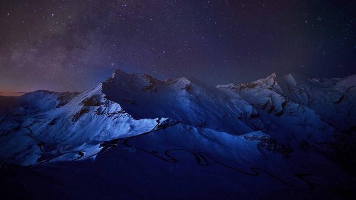 Snowy Mountains Under a Starry Night Sky