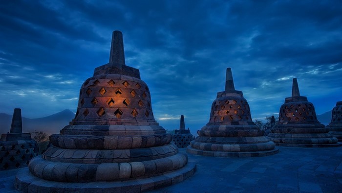 Borobudur Temple stupas at dusk, Indonesia