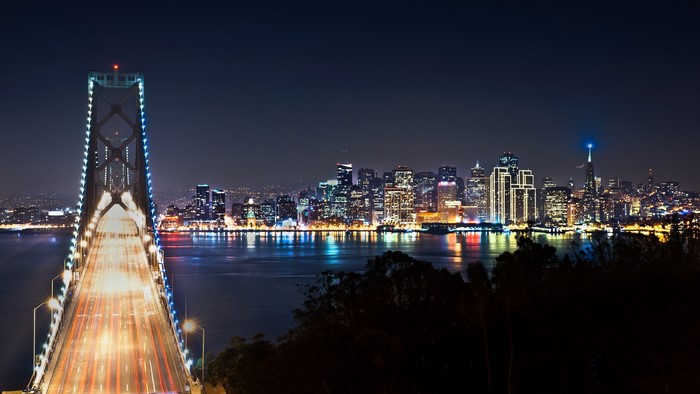 San Francisco Bay Bridge and Skyline at Night
