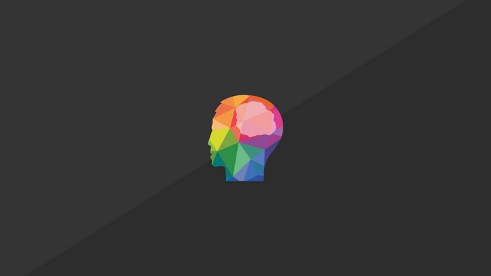 Colorful geometric human head with brain