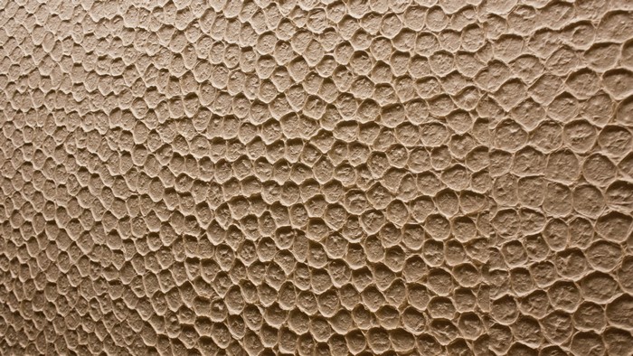Textured surface with a honeycomb pattern