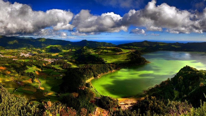 Green lake and rolling hills in the Azores Islands, Portugal