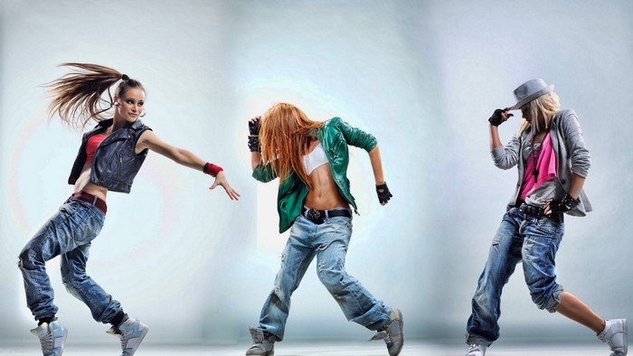 Three women dancing in hip-hop style