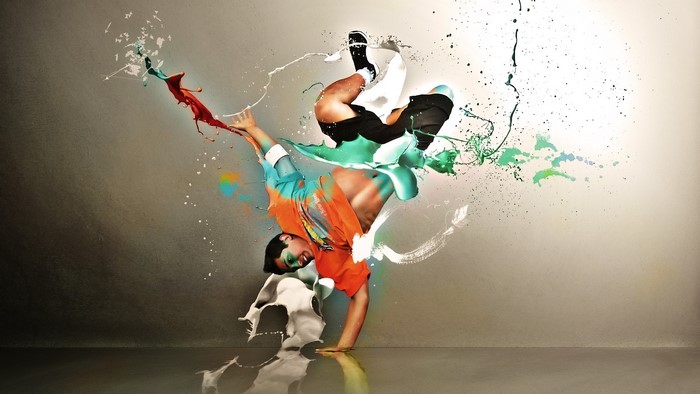 Breakdancer with colorful paint splashes