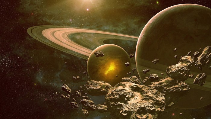 Asteroids and planets in space with rings