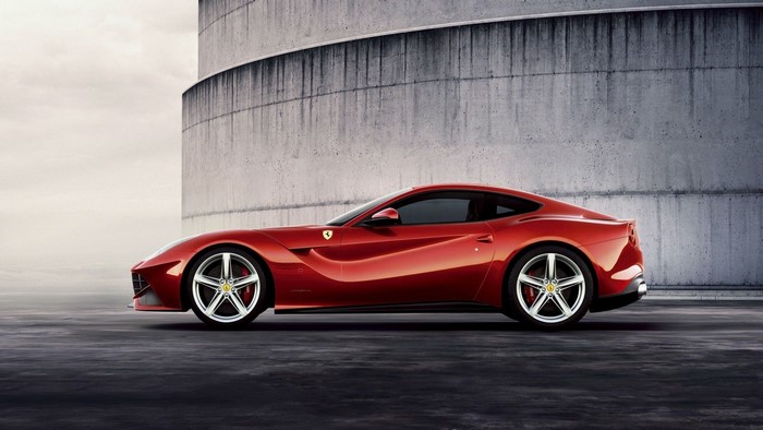 Red Ferrari F12 Berlinetta parked outdoors