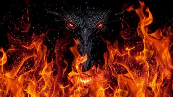 Dragon with glowing eyes in fire