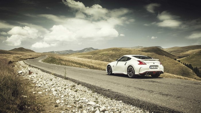 White Nissan 370Z Nismo on a winding road