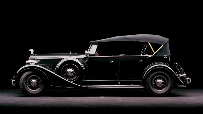 Black classic convertible car with a black roof