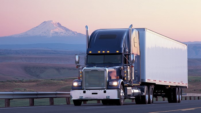 Freightliner Classic XL Truck with Mountain Background