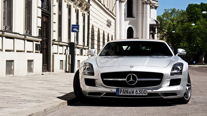 Silver Mercedes-Benz SLS AMG parked on a street