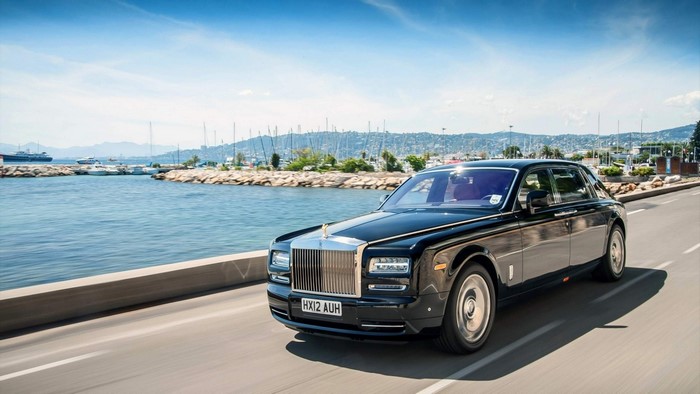 Rolls-Royce Phantom driving by the sea