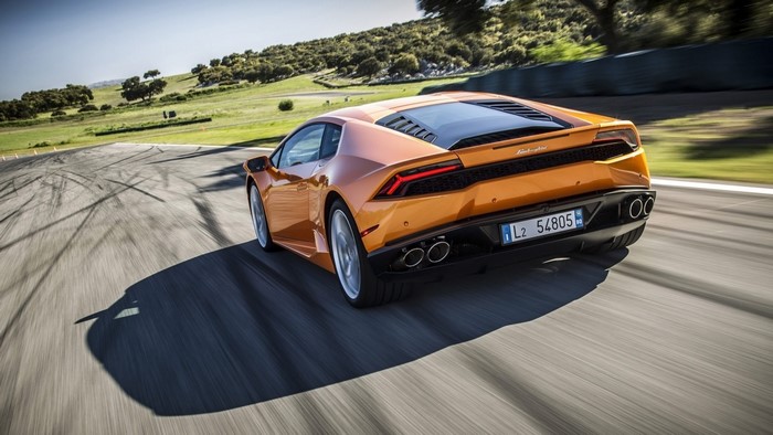 Orange Lamborghini Huracan on a Racetrack