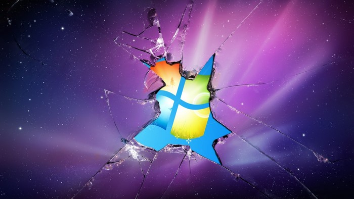 Broken Screen with Windows Logo and Starry Sky