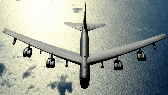 B-52 Stratofortress Bomber flying over water
