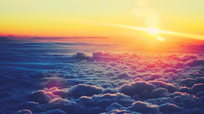 Sunset over a sea of clouds