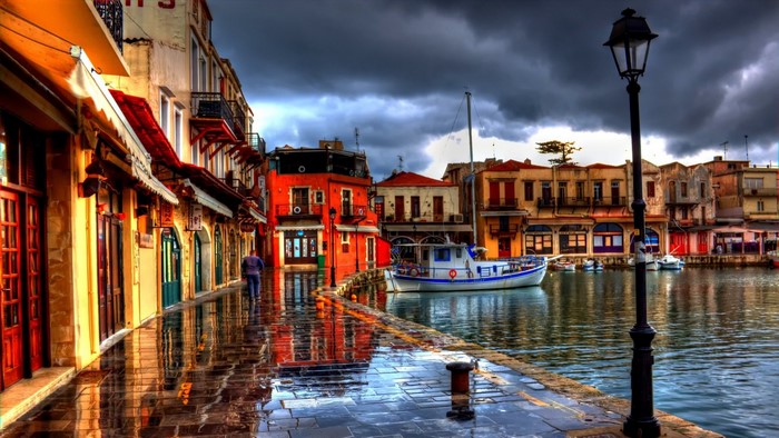 Rethymno, Greece harbor with boats and buildings
