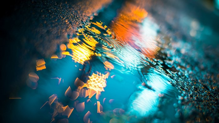 Abstract water surface with reflections of lights
