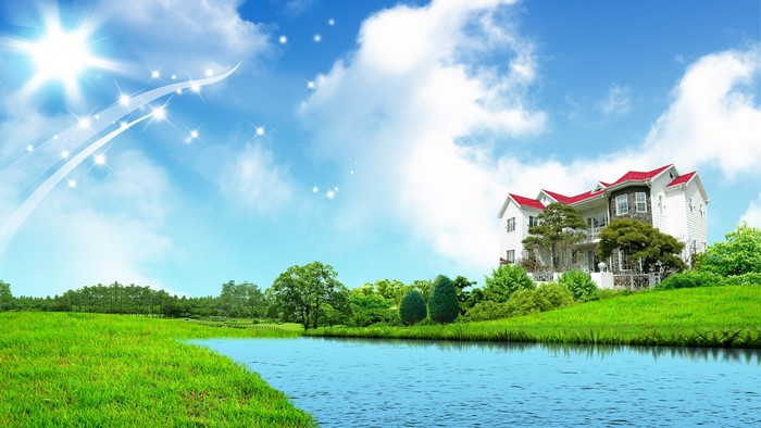 A beautiful white house with red roof by a lake
