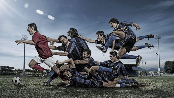 Soccer players in action on a field