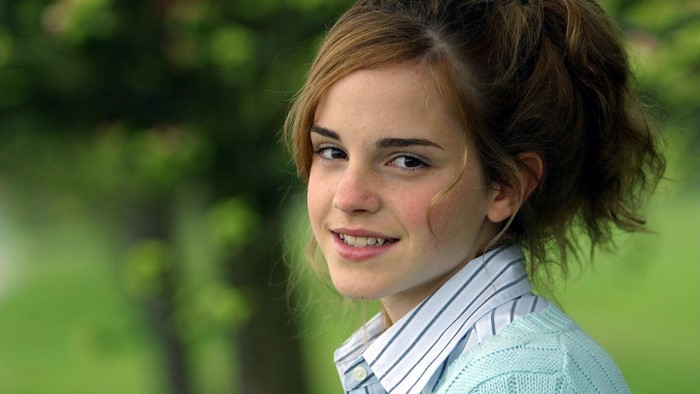 Emma Watson smiling outdoors