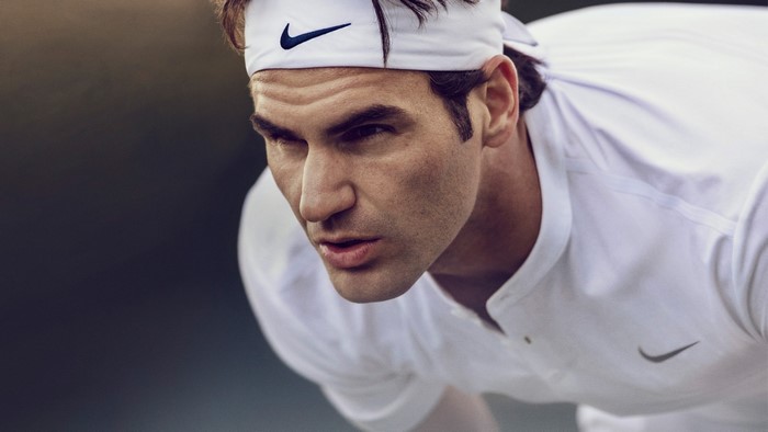 Roger Federer wearing Nike headband and shirt