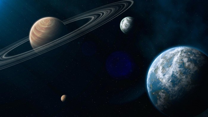 Planets and moons in space with Saturn-like planet