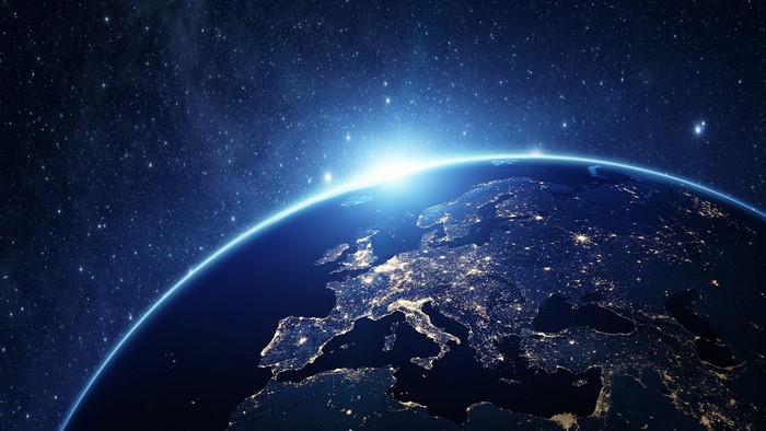 Earth at Night with Sunrise Over Europe