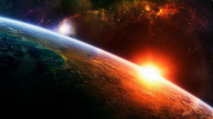 Sunrise over planet Earth from space