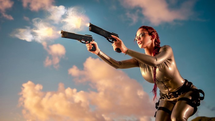 Lara Croft Cosplayer Firing Dual Pistols