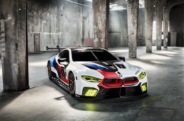 BMW M8 GTE race car in industrial building