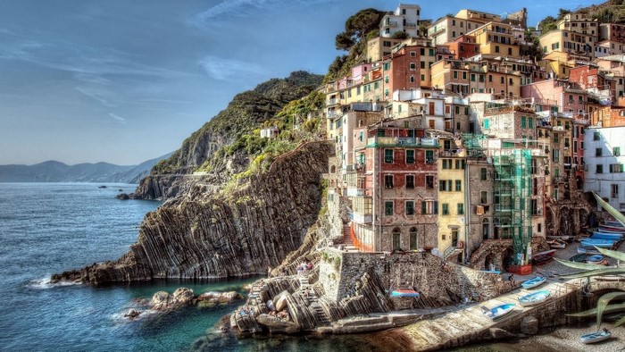 Colorful Italian village on a cliff overlooking the sea