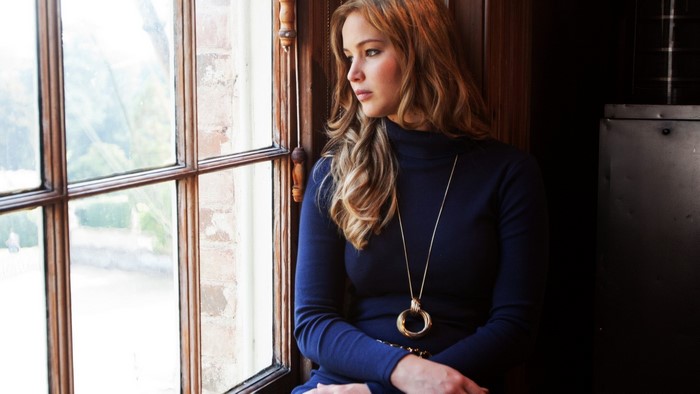 Jennifer Lawrence looking out a window