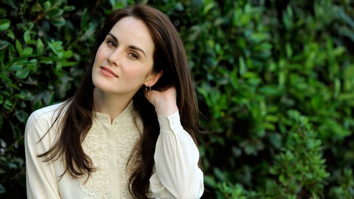 Michelle Dockery posing outdoors