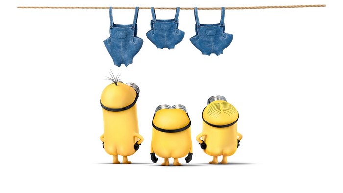 Minions hanging denim overalls on a clothesline