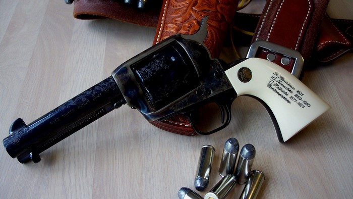 Colt Single Action Army Revolver with Bullets and Holster