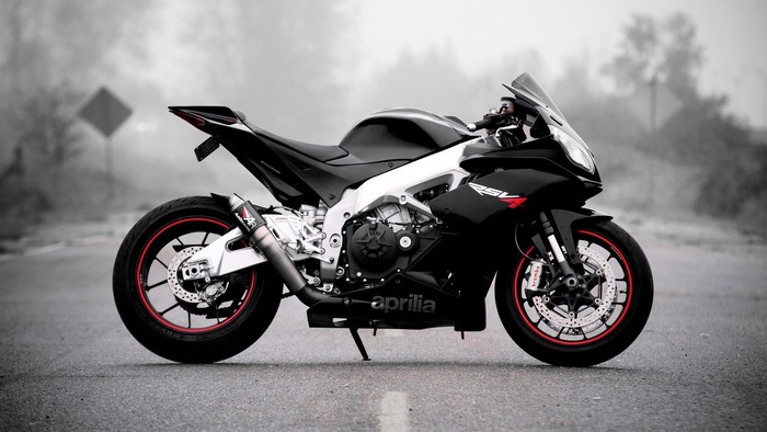 Black Aprilia RSV4 Motorcycle on a Road