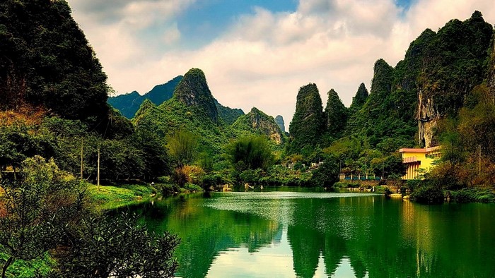 Green lake and karst mountains