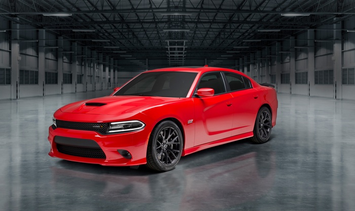 Red 2018 Dodge Charger in a warehouse