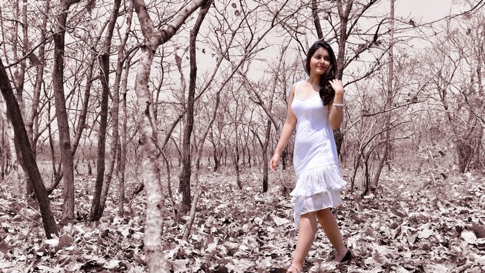 Rashi Khanna in a white dress in a forest