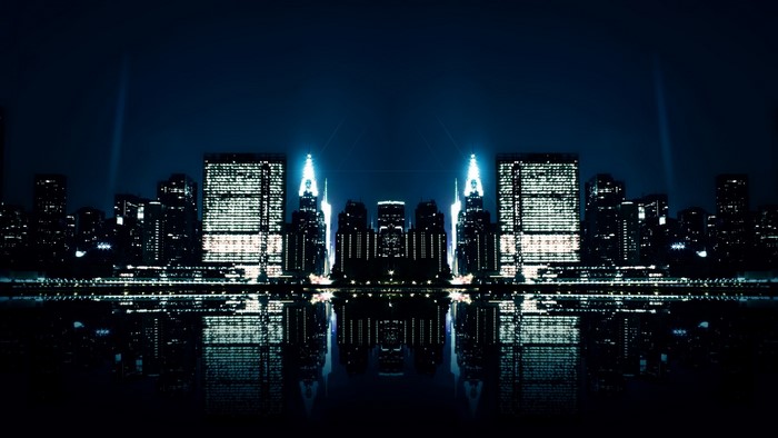 City Skyline at Night with Reflections